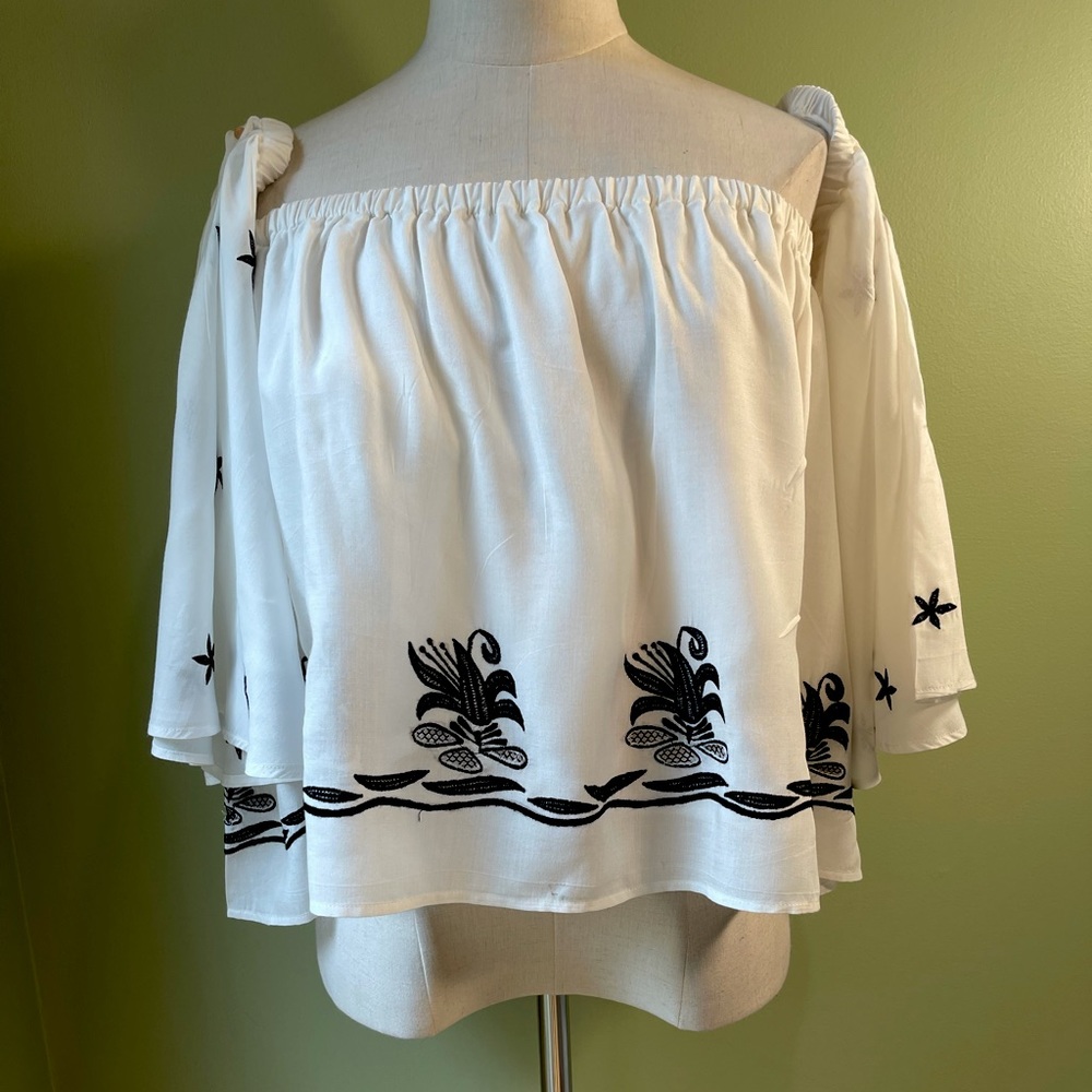 Karina Grimaldi White and Black Off-Shoulder Top
